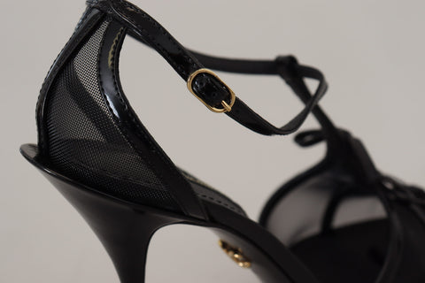 Black Dolce & Gabbana stiletto high heel sandals with ankle straps and pointed toes, stylish and elegant footwear.