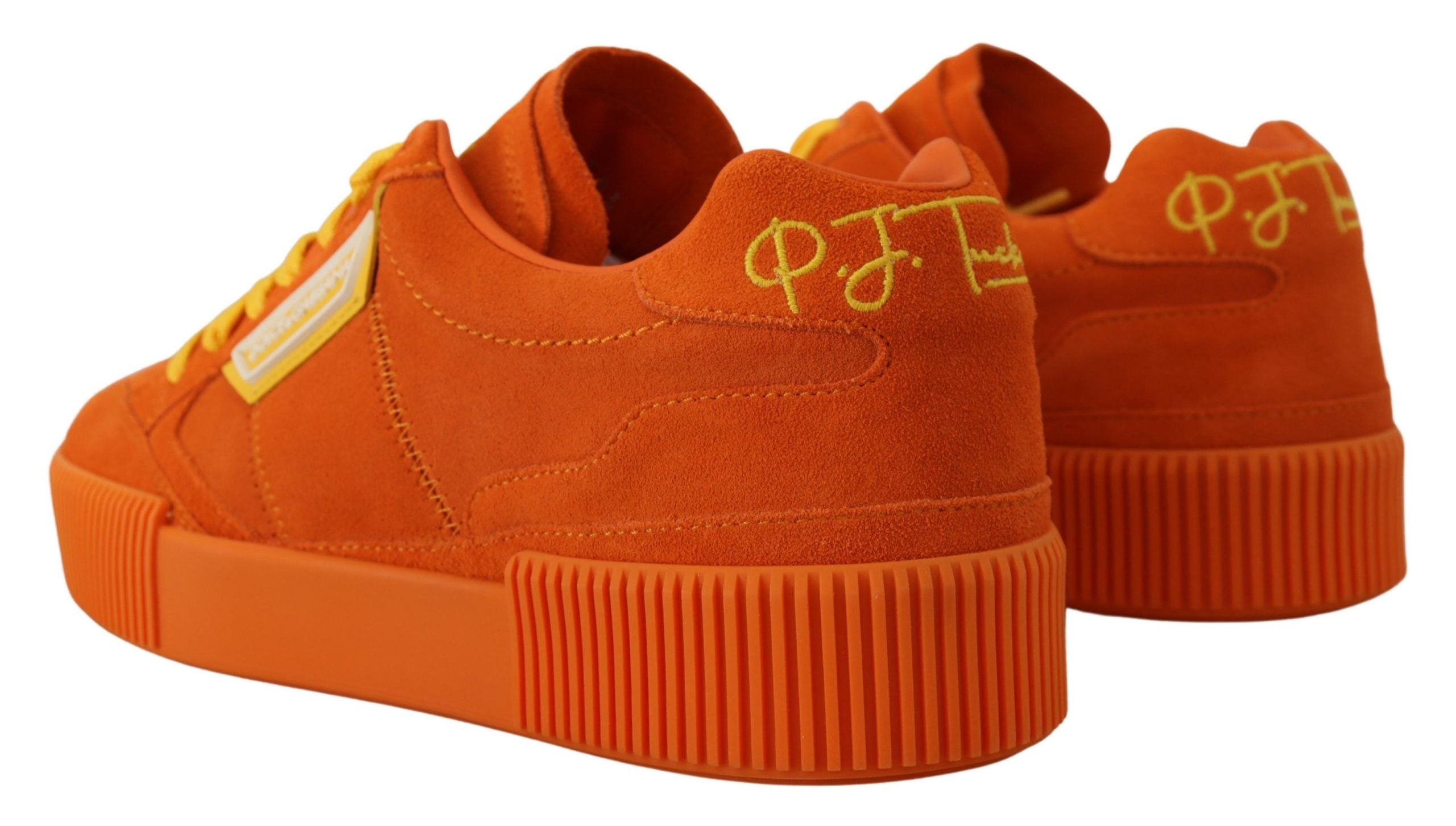 Orange leather P.J. Tucker sneakers by Dolce & Gabbana with white soles and stylish design, shown from a side angle.