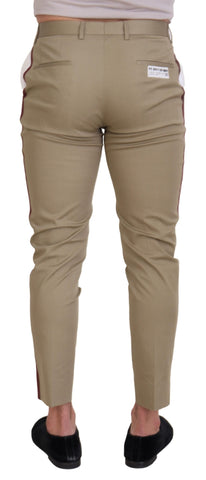 White and brown slim fit chino pants by Dolce & Gabbana, shown in a detailed front view.