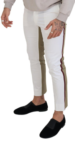 White and brown slim fit chino pants by Dolce & Gabbana, showcasing tailored fabric and stylish design details.