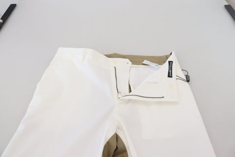 White and brown slim fit chino pants by Dolce & Gabbana, showing a tailored design and classic fit.
