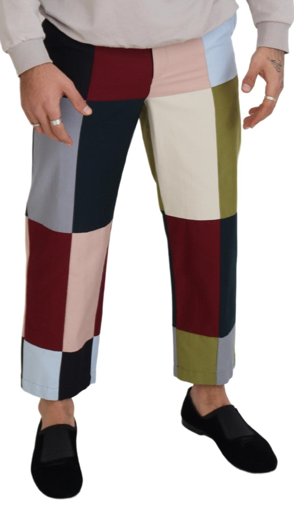 Multicolor cotton patchwork pants by Dolce & Gabbana featuring vibrant, mixed fabric patterns and a relaxed fit.