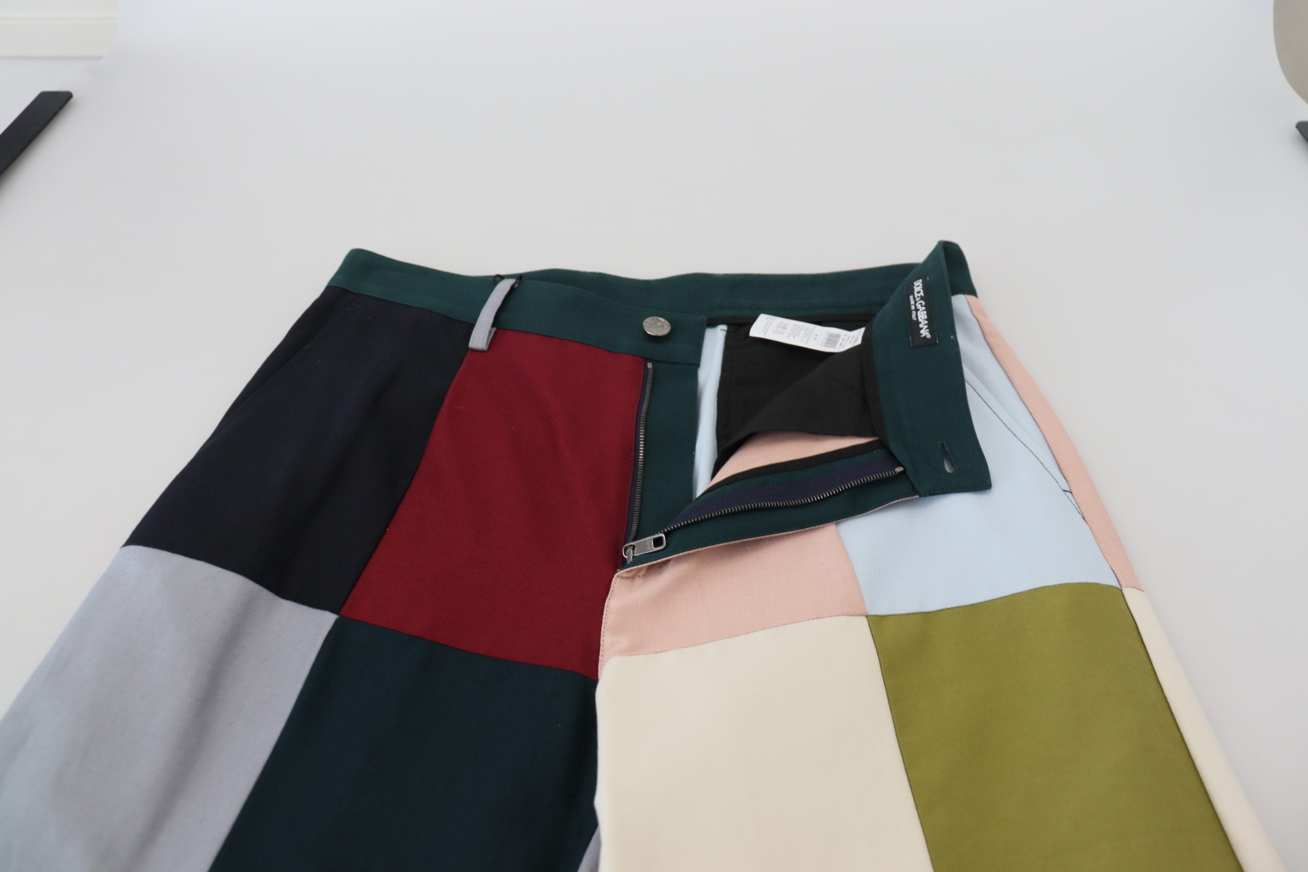 Multicolor cotton patchwork pants by Dolce & Gabbana featuring vibrant, mixed fabric designs and a relaxed fit.