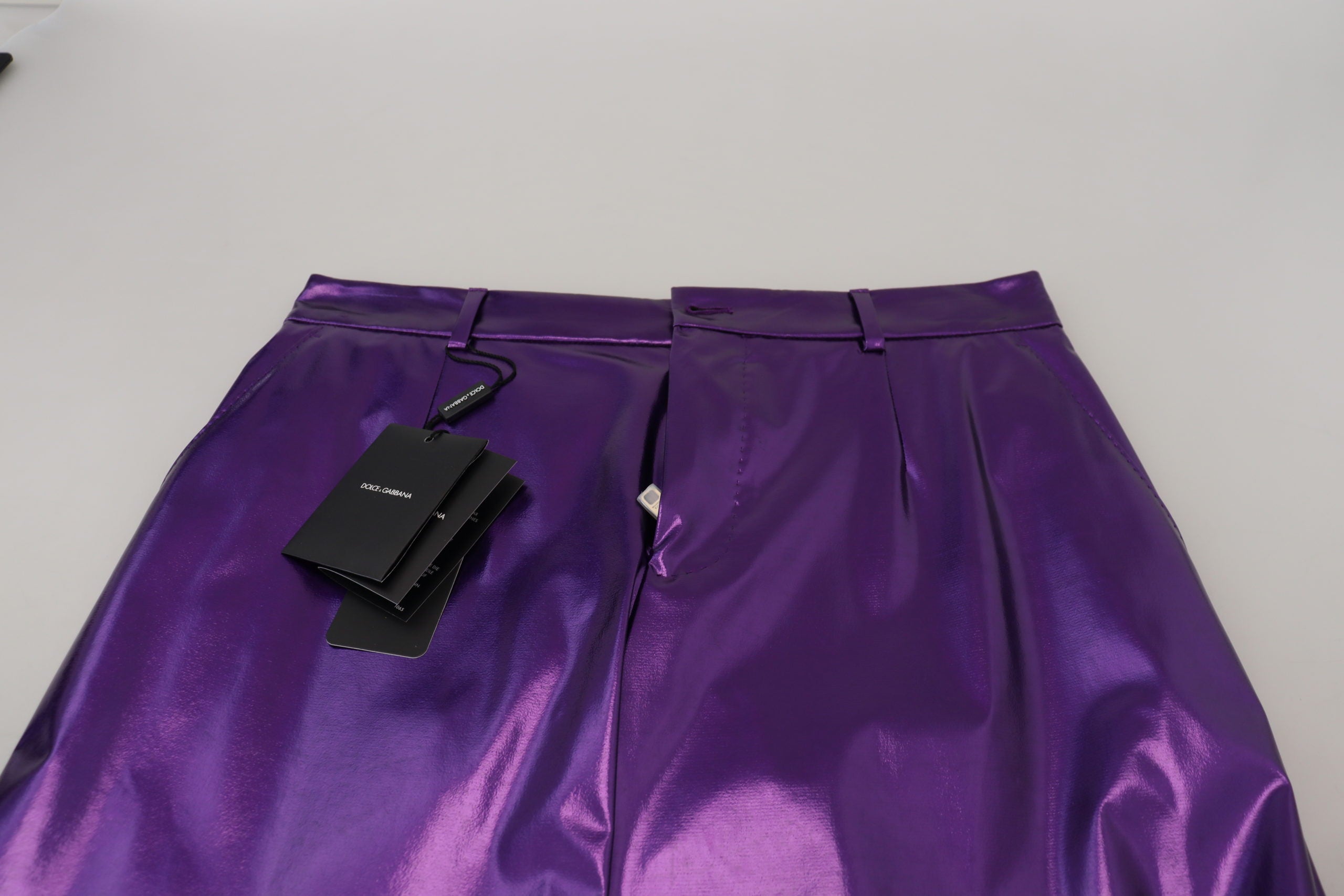 Purple shining men's casual pants by Dolce & Gabbana, featuring a sleek, stylish design with a glossy finish and modern fit.