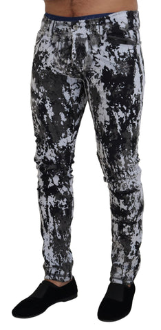 Multicolor cotton tie-dye skinny denim jeans by Dolce & Gabbana, showing vibrant pattern and fitted style.