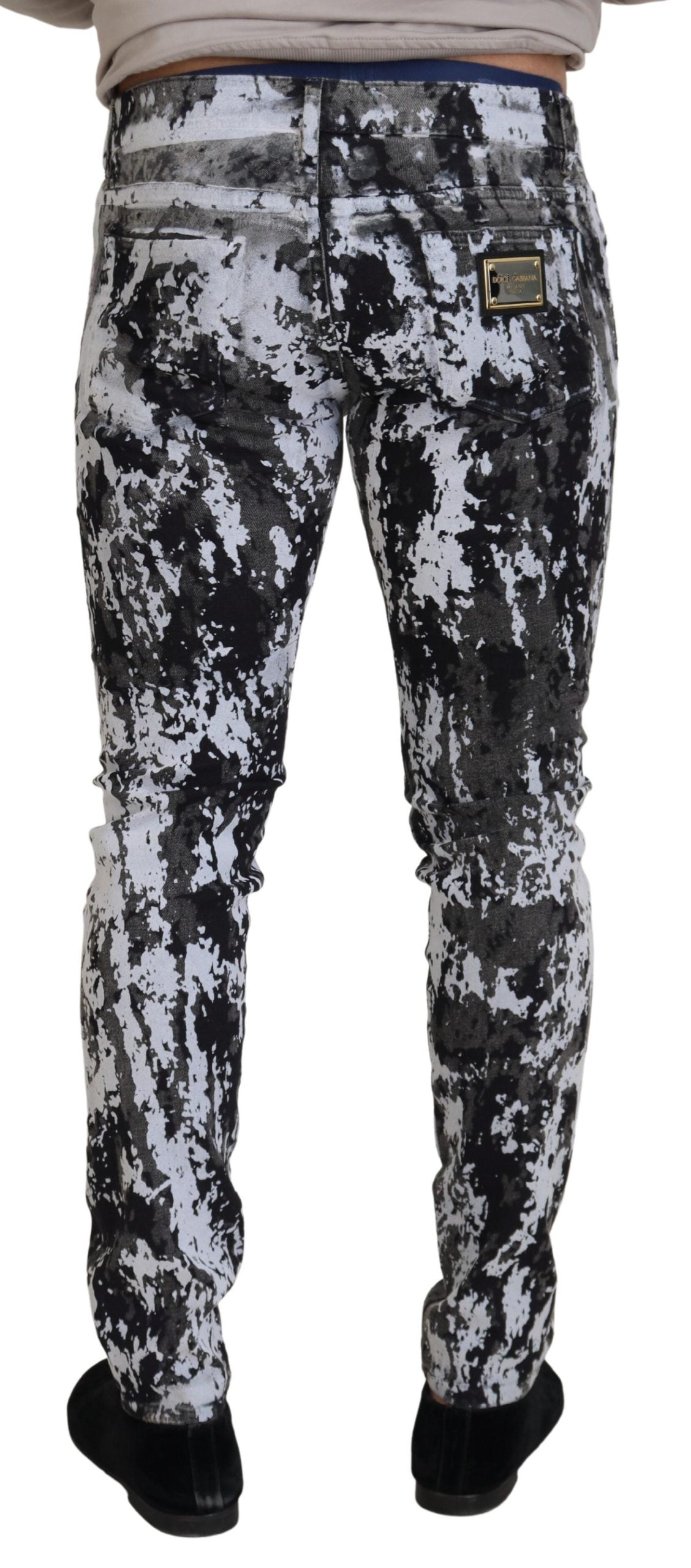 Multicolor cotton tie dye skinny denim jeans by Dolce & Gabbana, featuring vibrant patterns and classic five-pocket design.