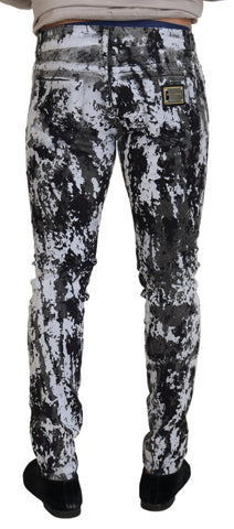 Multicolor cotton tie dye skinny denim jeans by Dolce & Gabbana, featuring vibrant patterns and classic five-pocket design.