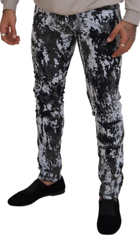 Multicolor cotton tie-dye skinny denim jeans by Dolce & Gabbana, showing vibrant pattern and fitted style.