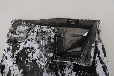Multicolor cotton tie-dye skinny denim jeans by Dolce & Gabbana, featuring vibrant patterns and classic denim style.