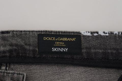 Multicolor cotton tie-dye skinny denim jeans by Dolce & Gabbana featuring vibrant, patterned fabric and classic five-pocket design.