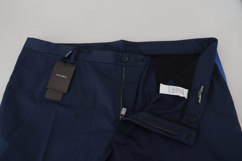 Blue cotton men's cropped pants by Dolce & Gabbana displayed on a model, showcasing a relaxed fit and stylish design.
