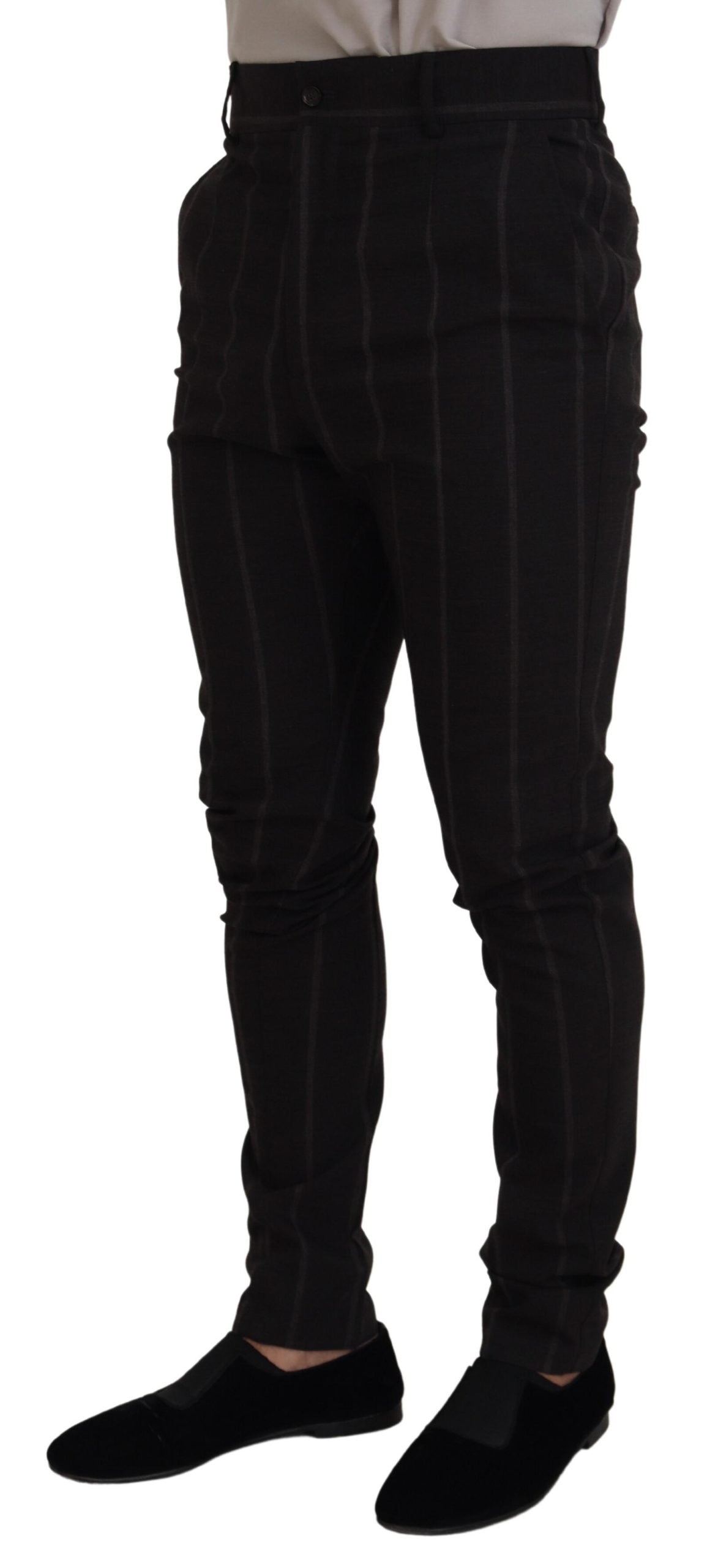 Black wool chino formal men's pants by Dolce & Gabbana, tailored fit with front and back pockets, close-up view of fabric and details.