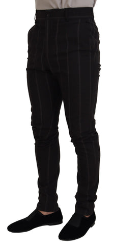 Black wool chino formal men's pants by Dolce & Gabbana, tailored fit with front and back pockets, close-up view of fabric and details.