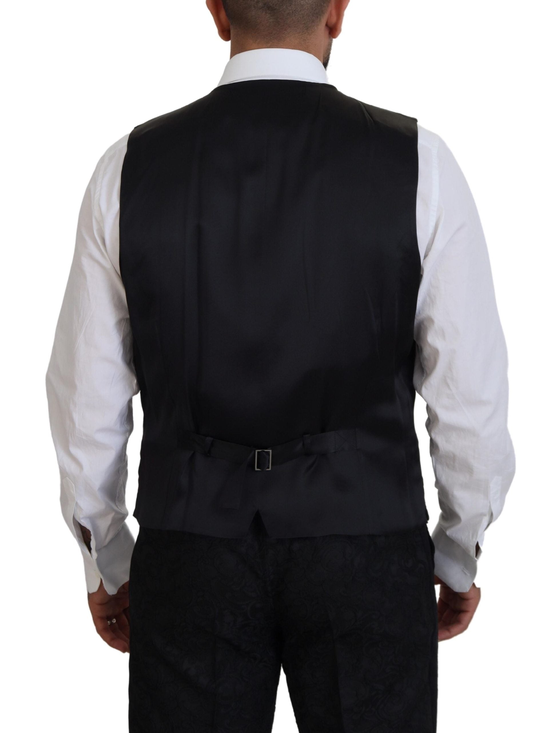 Black gold fantasy tuxedo slim fit suit by Dolce & Gabbana, featuring a sleek tailored design with shimmering gold accents.