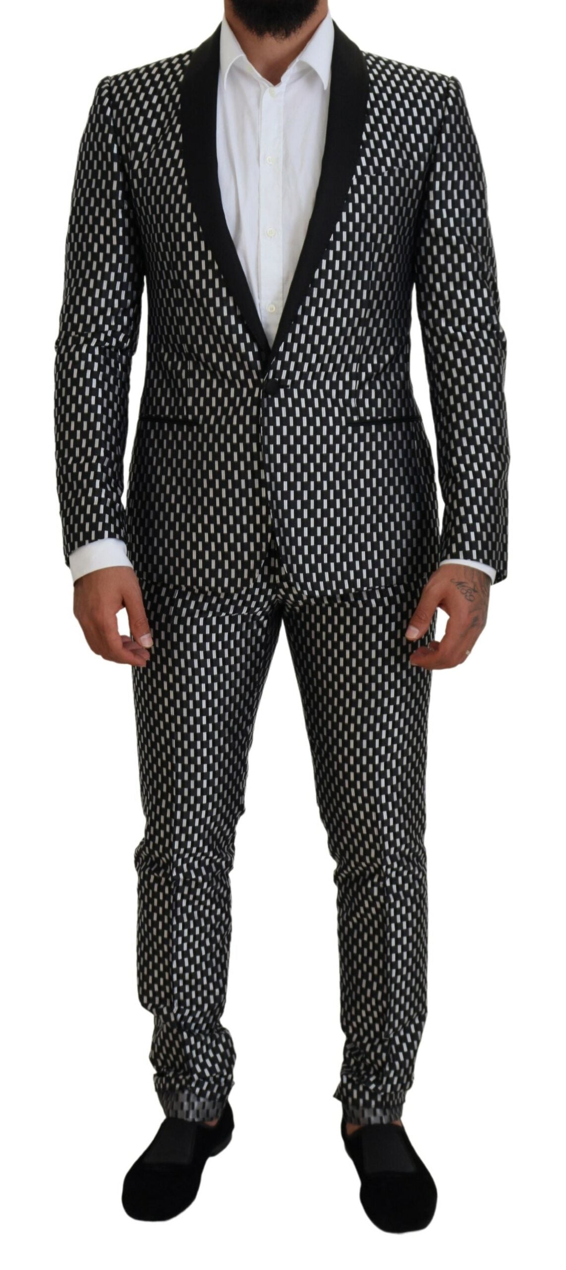 Black and white silk Martini slim fit suit by Dolce & Gabbana, featuring tailored design and classic lapel collar.