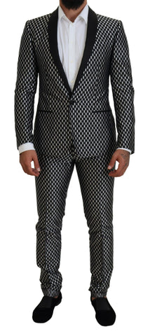 Black and white silk Martini slim fit suit by Dolce & Gabbana, featuring tailored design and classic lapel collar.
