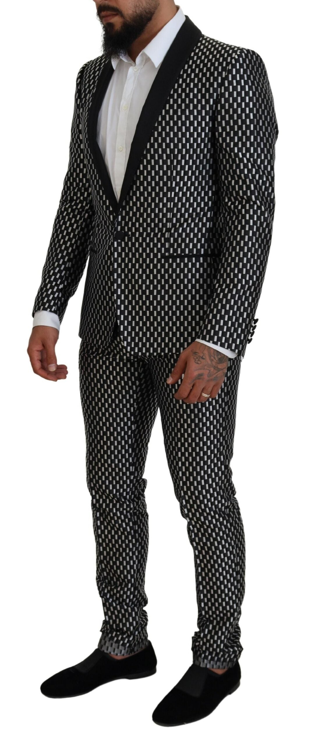 Black and white silk Martini slim fit suit by Dolce & Gabbana, tailored with sharp lapels and sleek design.