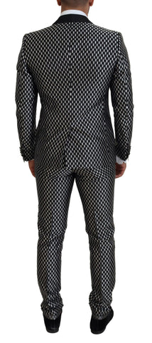 Black and white silk Martini slim fit suit by Dolce & Gabbana, tailored with sharp lapels and a sleek, modern design.
