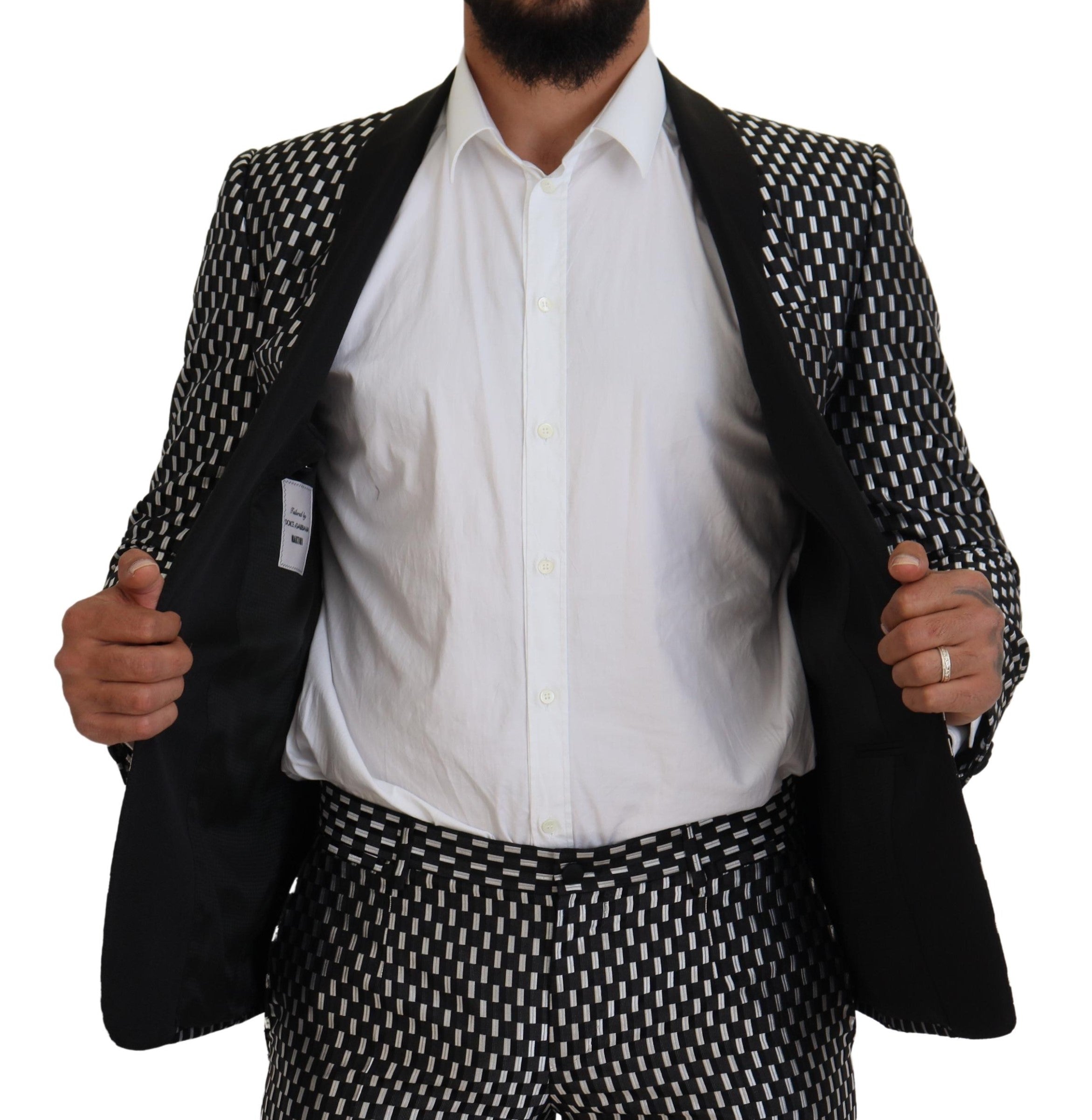 Black and white silk Martini slim fit suit by Dolce & Gabbana, tailored with sleek lapels and modern fit for formal occasions.