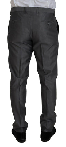 Gray Dolce & Gabbana Sicilia 3-piece slim fit suit, tailored suit jacket, trousers, and vest displayed on a hanger.