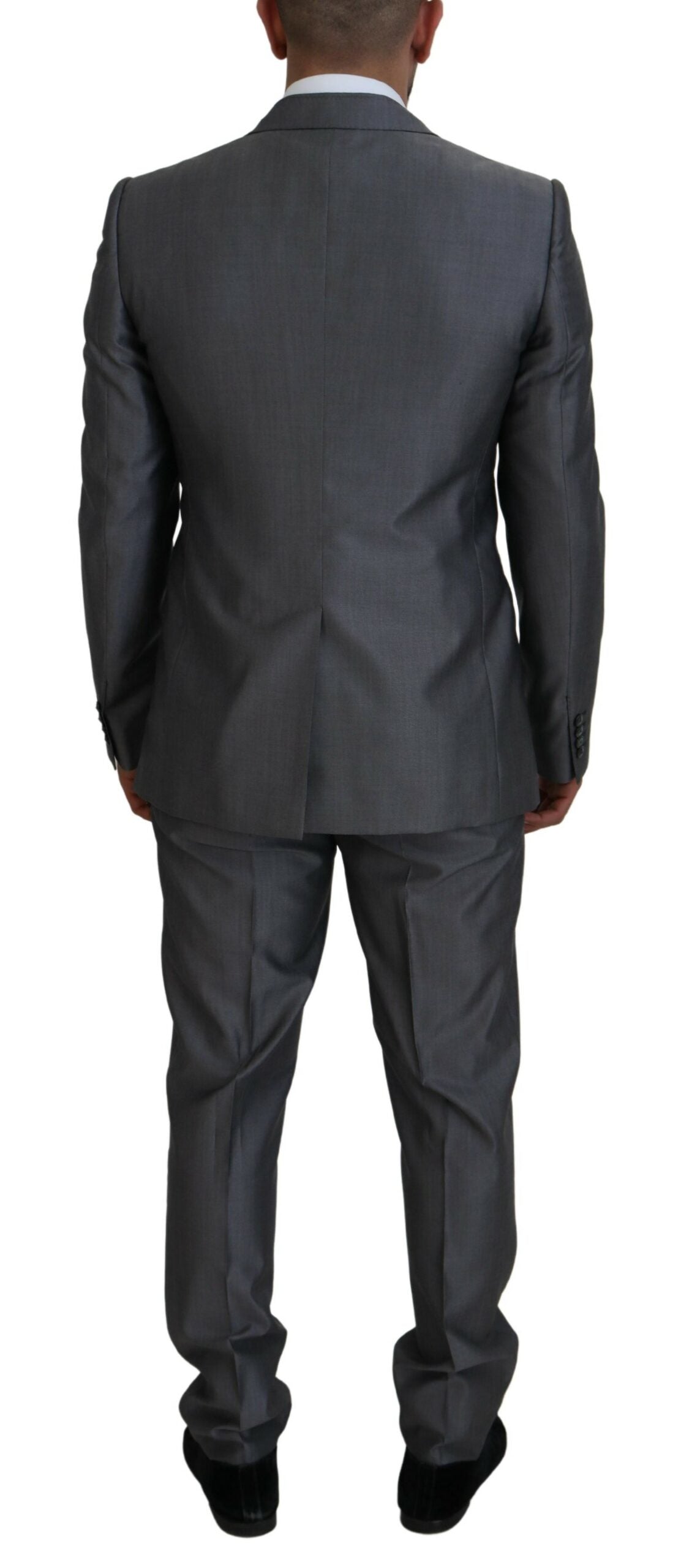 Gray Dolce & Gabbana Sicilia 3-piece slim fit suit displayed on a mannequin, featuring a tailored jacket, vest, and trousers.