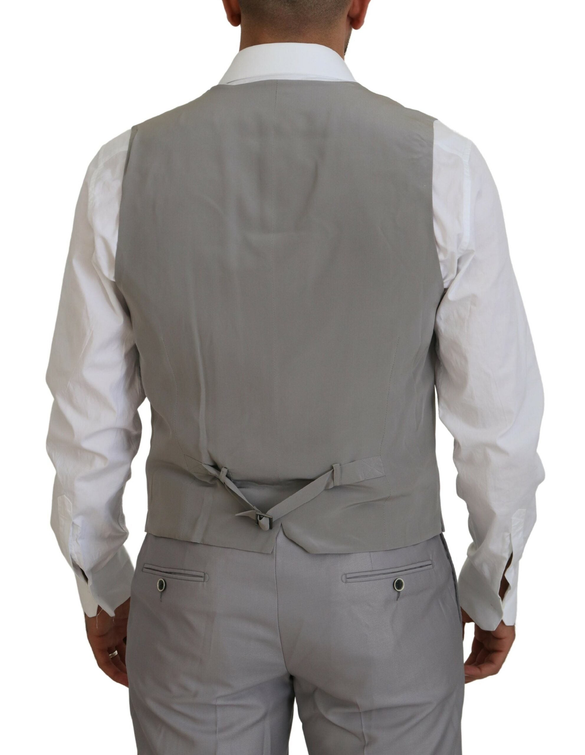Silver wool silk 3-piece slim fit suit by Dolce & Gabbana, shown on a mannequin with tailored details visible.