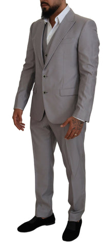 Silver wool silk 3-piece slim fit suit by Dolce & Gabbana, featuring tailored jacket, matching trousers, and a sleek waistcoat.
