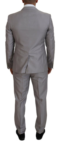 Silver wool silk 3-piece slim fit suit by Dolce & Gabbana, featuring tailored jacket, vest, and matching trousers.
