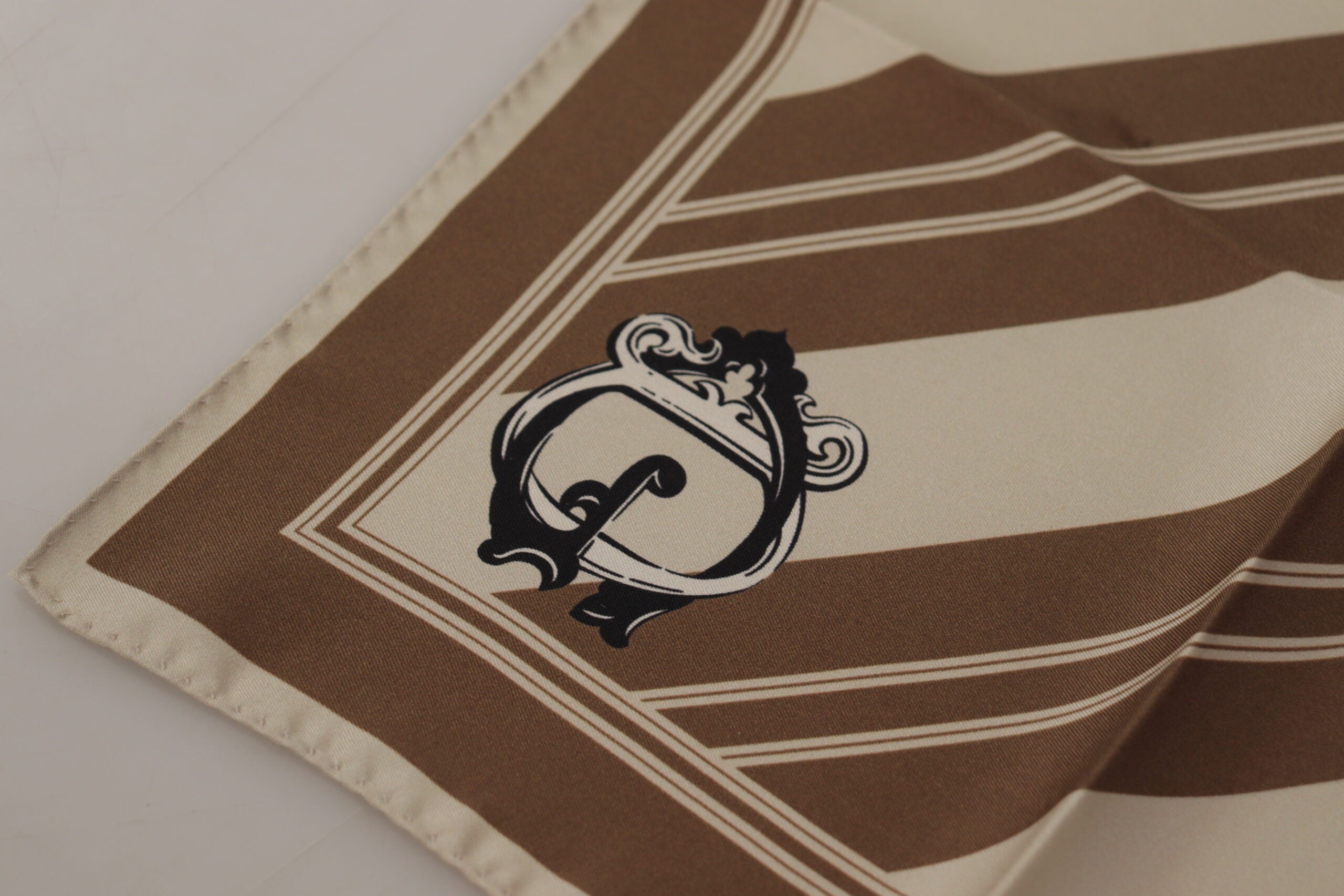 Brown striped Dolce & Gabbana men's square handkerchief scarf with DG logo design, made of soft fabric, stylish accessory.