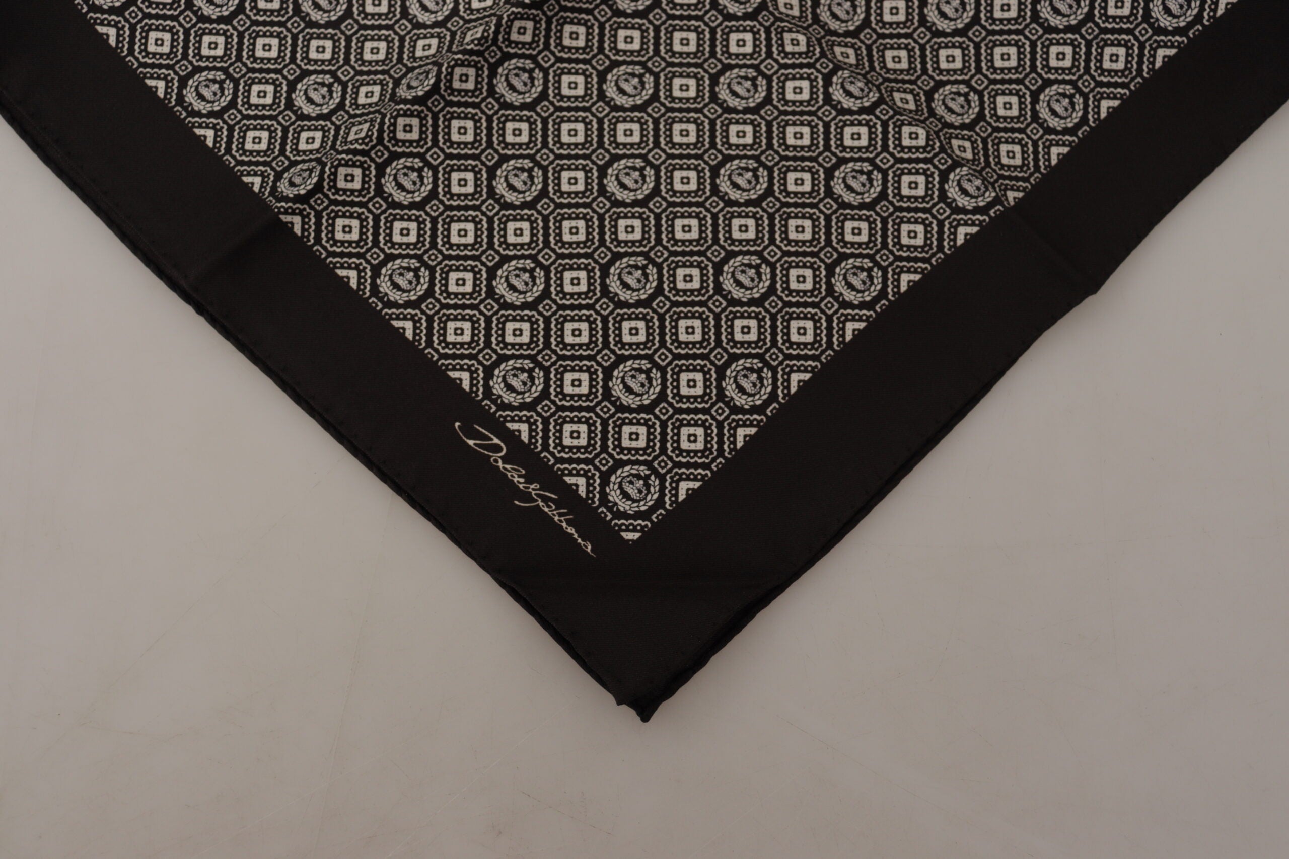 Black patterned Dolce & Gabbana logo square handkerchief scarf with stylish design and soft fabric.