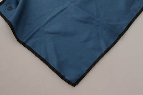 Black and blue Dolce & Gabbana crown printed square handkerchief scarf with intricate design and soft fabric.