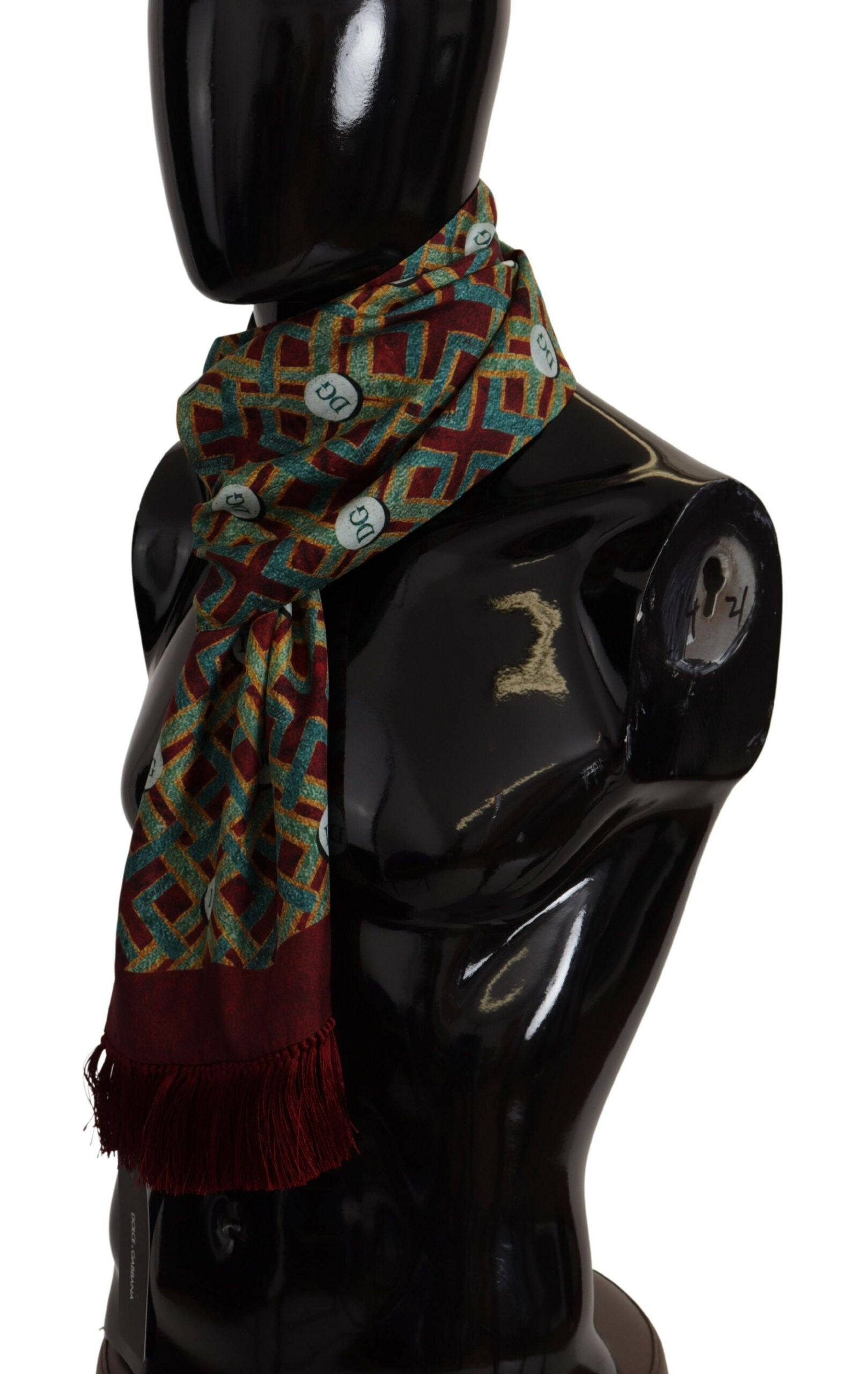 Multicolor Dolce & Gabbana logo shawl with fringe, warm neck wrap scarf featuring vibrant colors and stylish design.