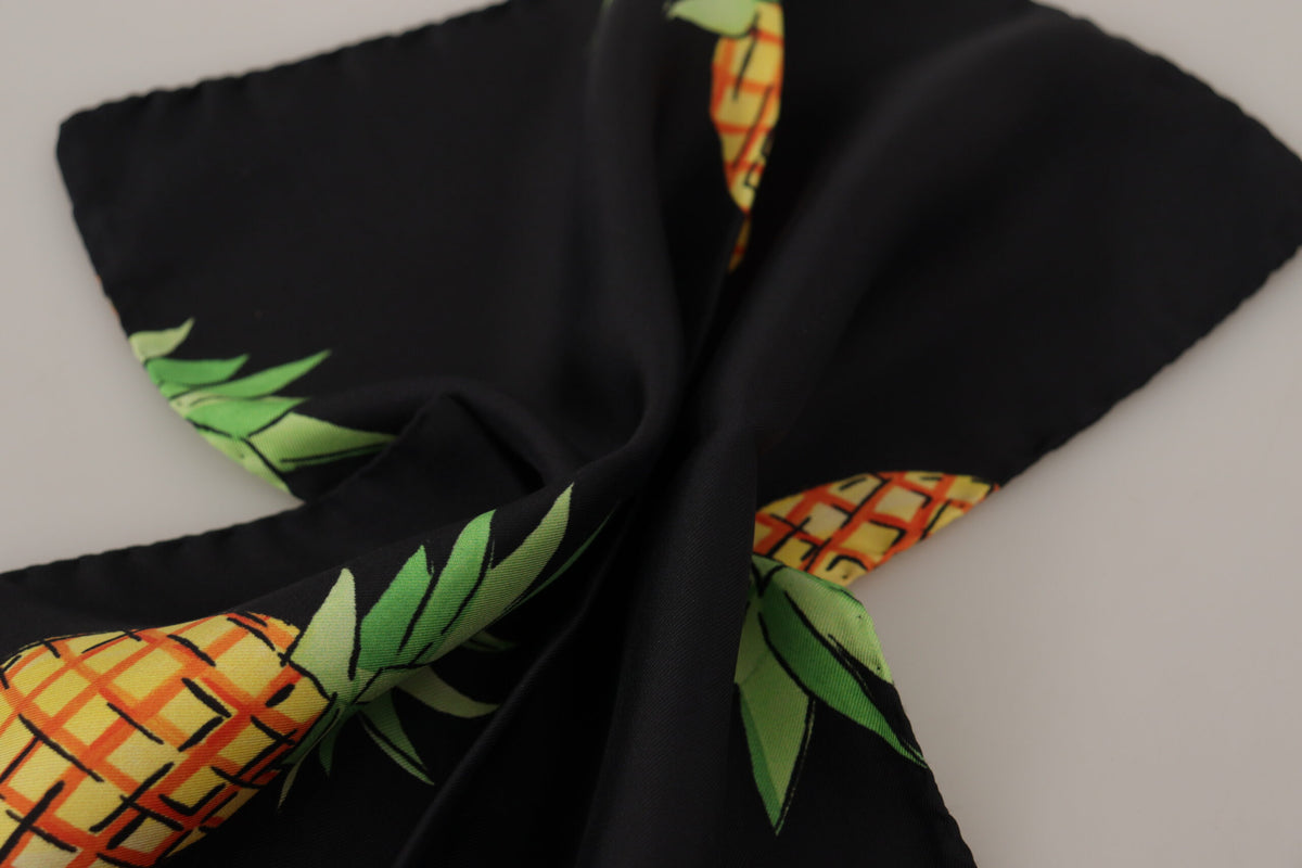 Black pineapple printed square handkerchief scarf by Dolce & Gabbana with vibrant tropical design, lightweight fabric, and classic style.