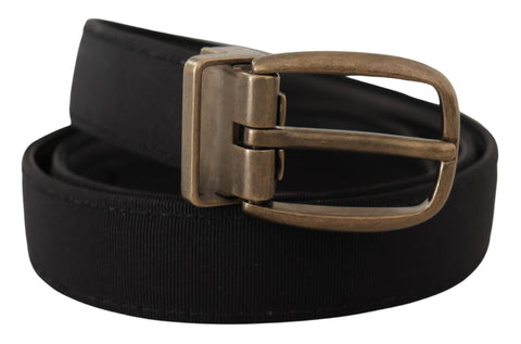 Black grosgrain leather belt with bronze metal buckle from Dolce & Gabbana, featuring a sleek, stylish design.