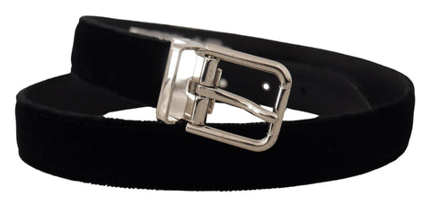 Black velvet belt with silver tone metal logo buckle, Dolce & Gabbana fashion accessory, close-up of stylish belt design