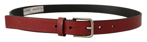 Maroon Vitello leather Dolce & Gabbana belt with silver metal buckle, showcasing detailed craftsmanship and sleek design.
