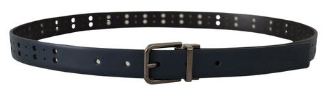 Blue perforated leather skinny belt with a metal buckle from Dolce & Gabbana, featuring a stylish and modern design.