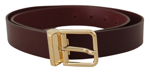 Maroon Vitello leather belt with gold metal buckle from Dolce & Gabbana, featuring a sleek, stylish design.