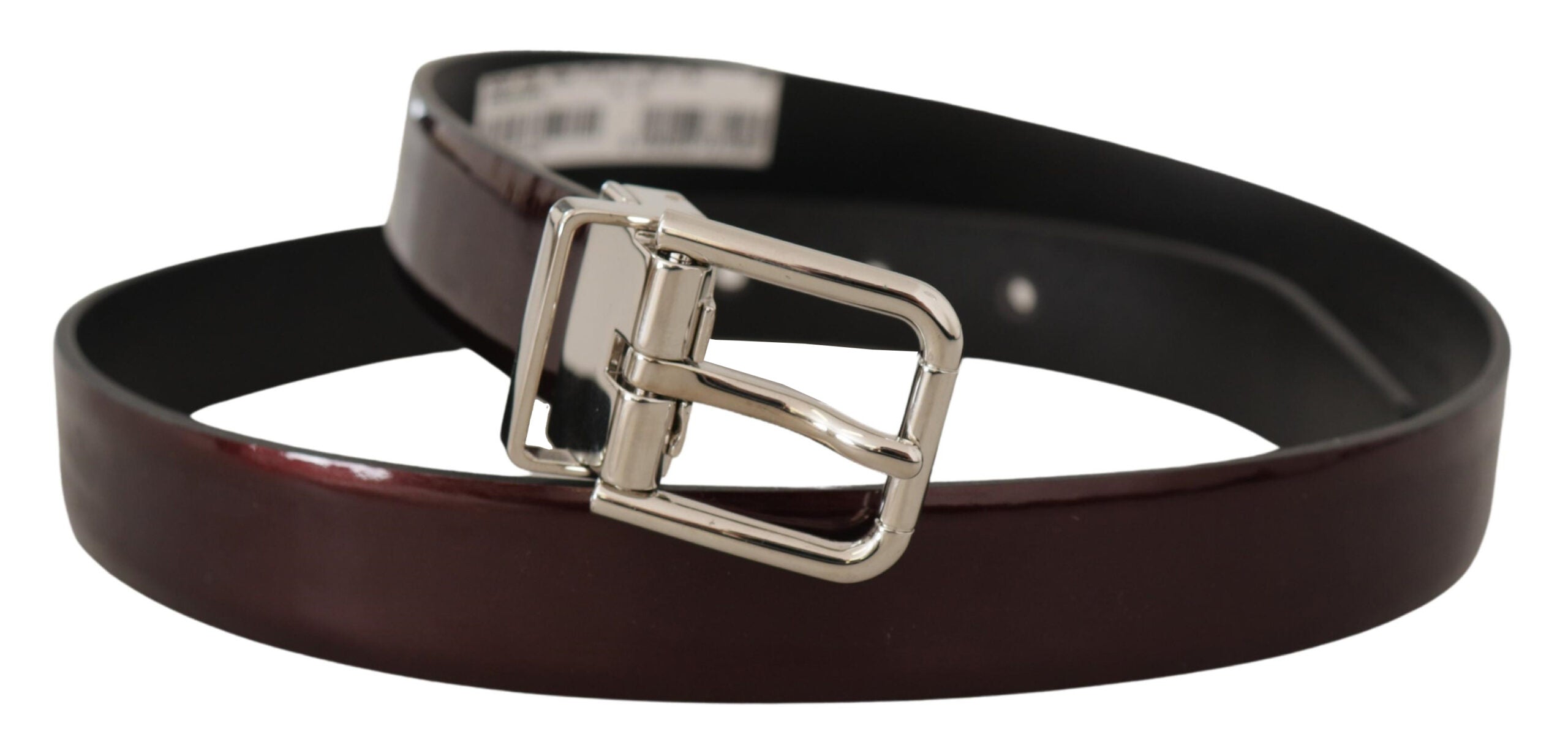 Brown patent leather belt with silver metal buckle, stylish Dolce & Gabbana accessory, detailed close-up showing texture and hardware.
