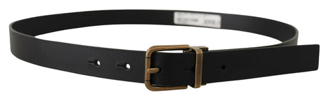 Black leather belt with brass metal box buckle by Dolce & Gabbana, featuring a sleek and stylish design with detailed craftsmanship.