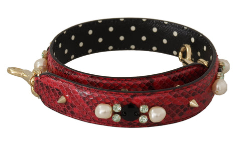 Red exotic leather crystals bag shoulder strap by Dolce & Gabbana, featuring sparkling embellishments and luxurious leather details.
