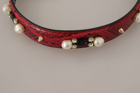 Red exotic leather shoulder strap with crystal embellishments for Dolce & Gabbana handbags, featuring luxurious design details.