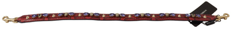 Red exotic leather shoulder strap with crystal embellishments for Dolce & Gabbana bags, featuring luxurious craftsmanship and detailed design.