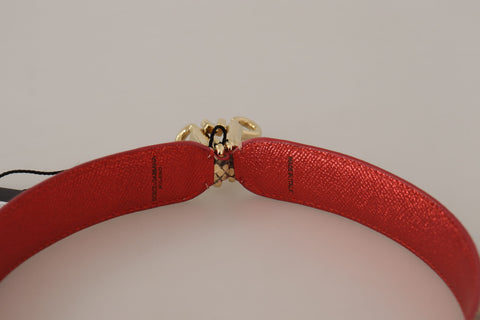 Beige exotic leather shoulder strap with crystal embellishments for Dolce & Gabbana handbags, detailed close-up of the strap's texture and adornments.
