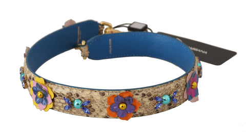 Beige python leather shoulder strap with floral and studded details, designed by Dolce & Gabbana.