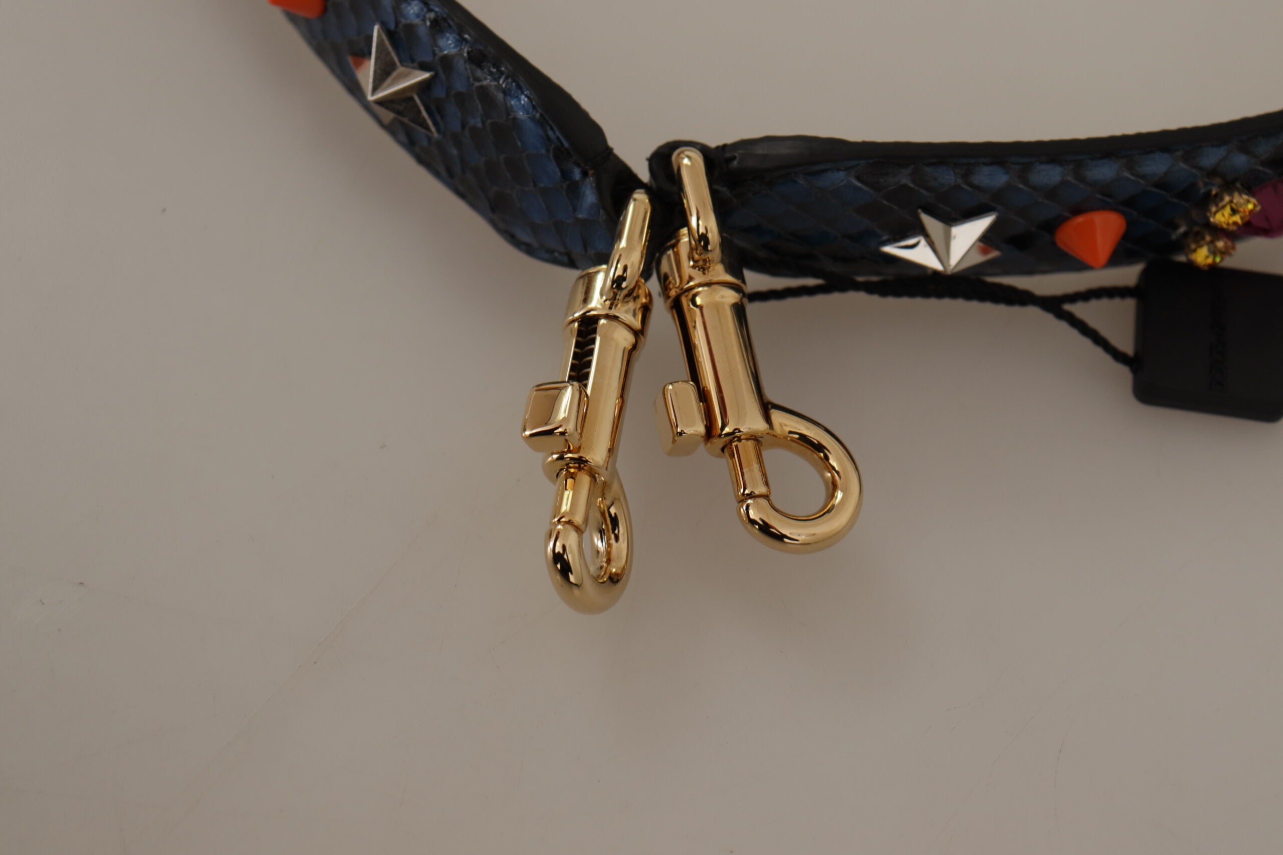 Blue exotic leather reversible shoulder strap with crystal accents from Dolce & Gabbana, showcasing luxurious craftsmanship and detailed design.