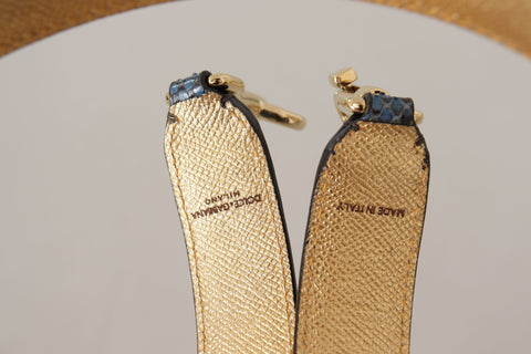 Blue exotic leather shoulder strap with crystal embellishments by Dolce & Gabbana, featuring intricate design and luxurious details.