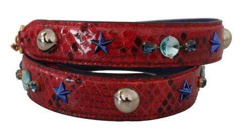 Red exotic leather shoulder strap with crystal embellishments from Dolce & Gabbana, featuring intricate detailing and luxurious craftsmanship.