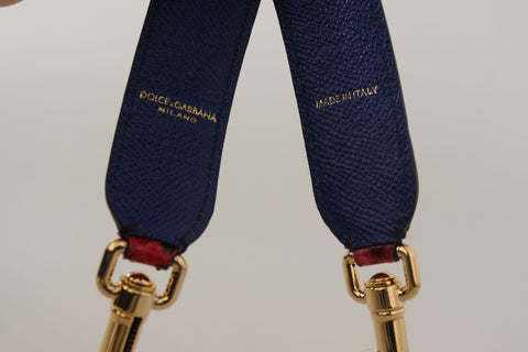 Red exotic leather shoulder strap with crystal embellishments by Dolce & Gabbana, featuring detailed textured leather and decorative crystals.