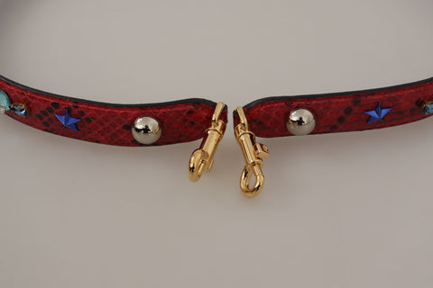 Red exotic leather shoulder strap with crystal embellishments by Dolce & Gabbana, featuring intricate detailing and high-quality craftsmanship.